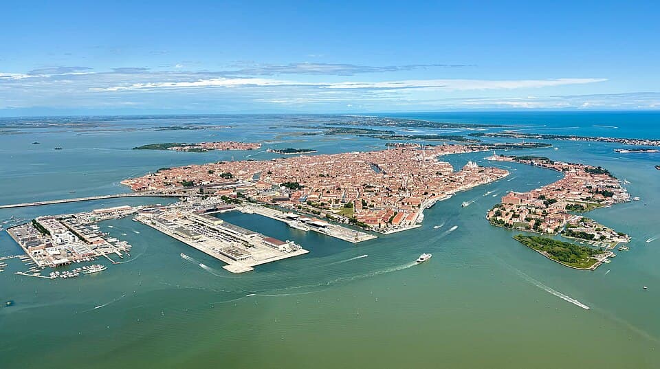 Aerial view of Venice and Giudecca surrounded by the blue Venetian Lagoon